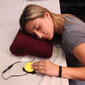 Girl using Sound Pillow