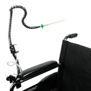 Black chair with a sip and puff switch attachment.